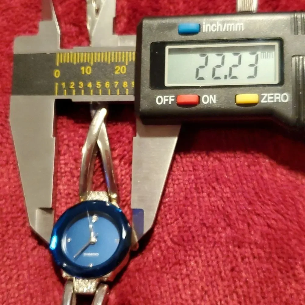 Silvertone &‎ Cobalt Blue Diamond Face Silvertone Band Ladies Watch